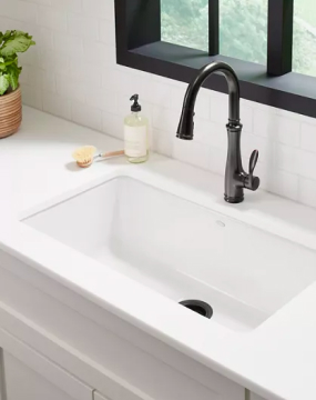 Kohler bathroom sink and black faucet