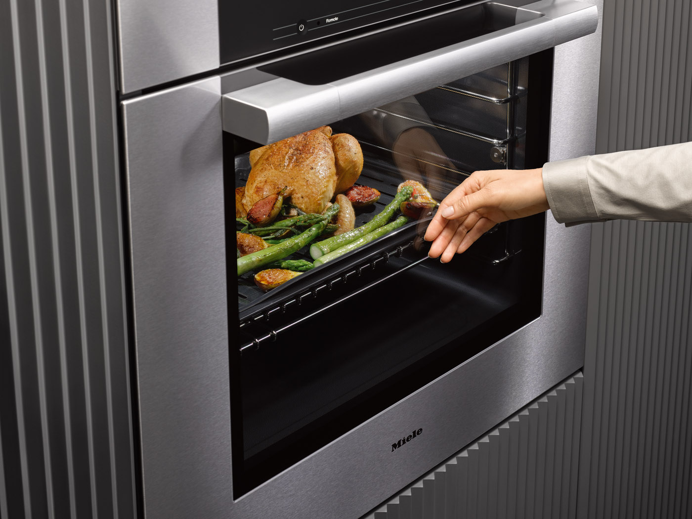 Miele stainless steel kitchen oven with cool-touch technology