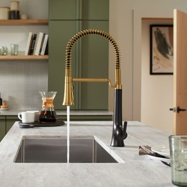 KOHLER Tone® semi-professional kitchen sink faucet in a brass and black finish